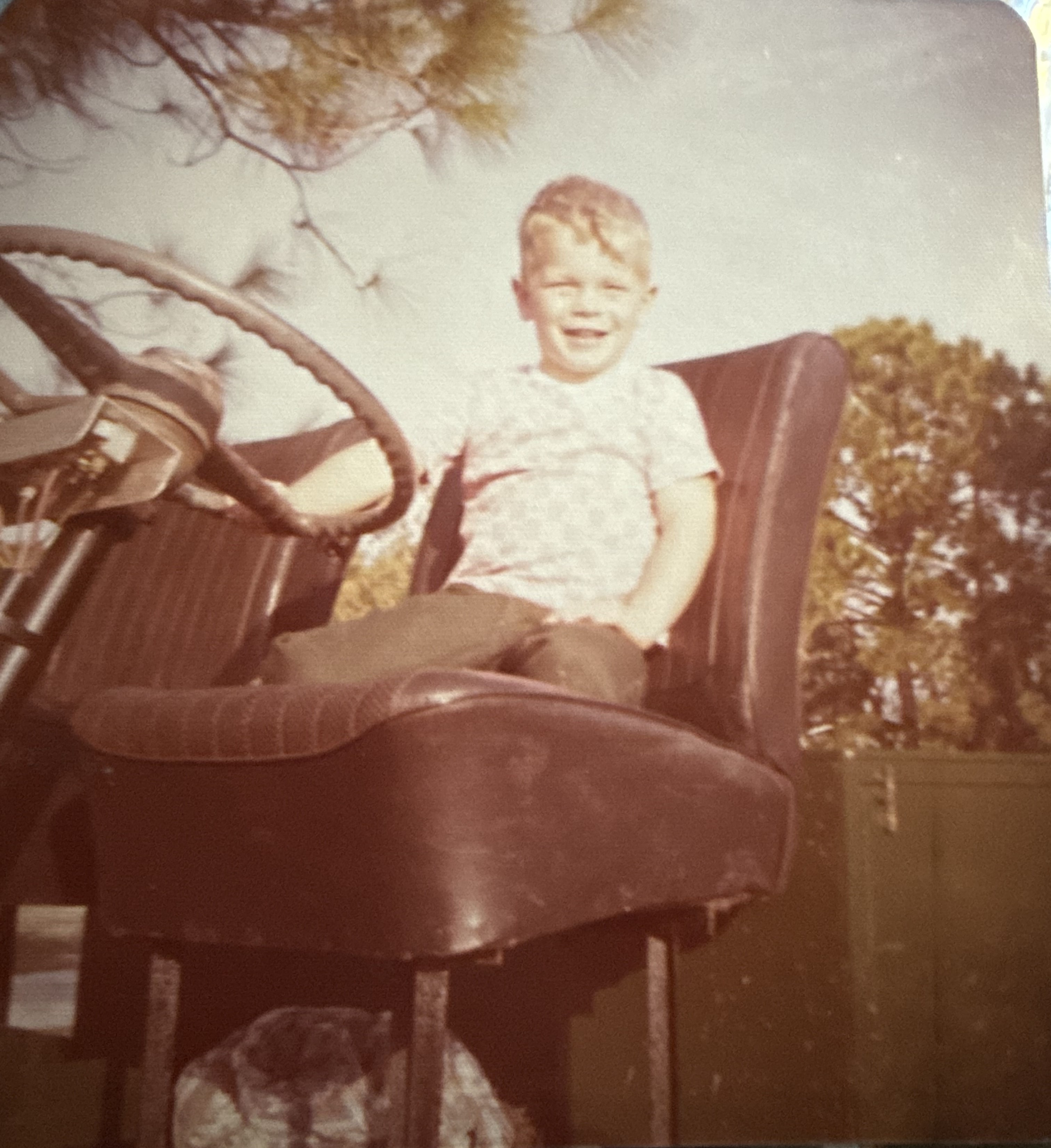 Young John Evers on his grandfather's swamp buggy in Naples, Florida