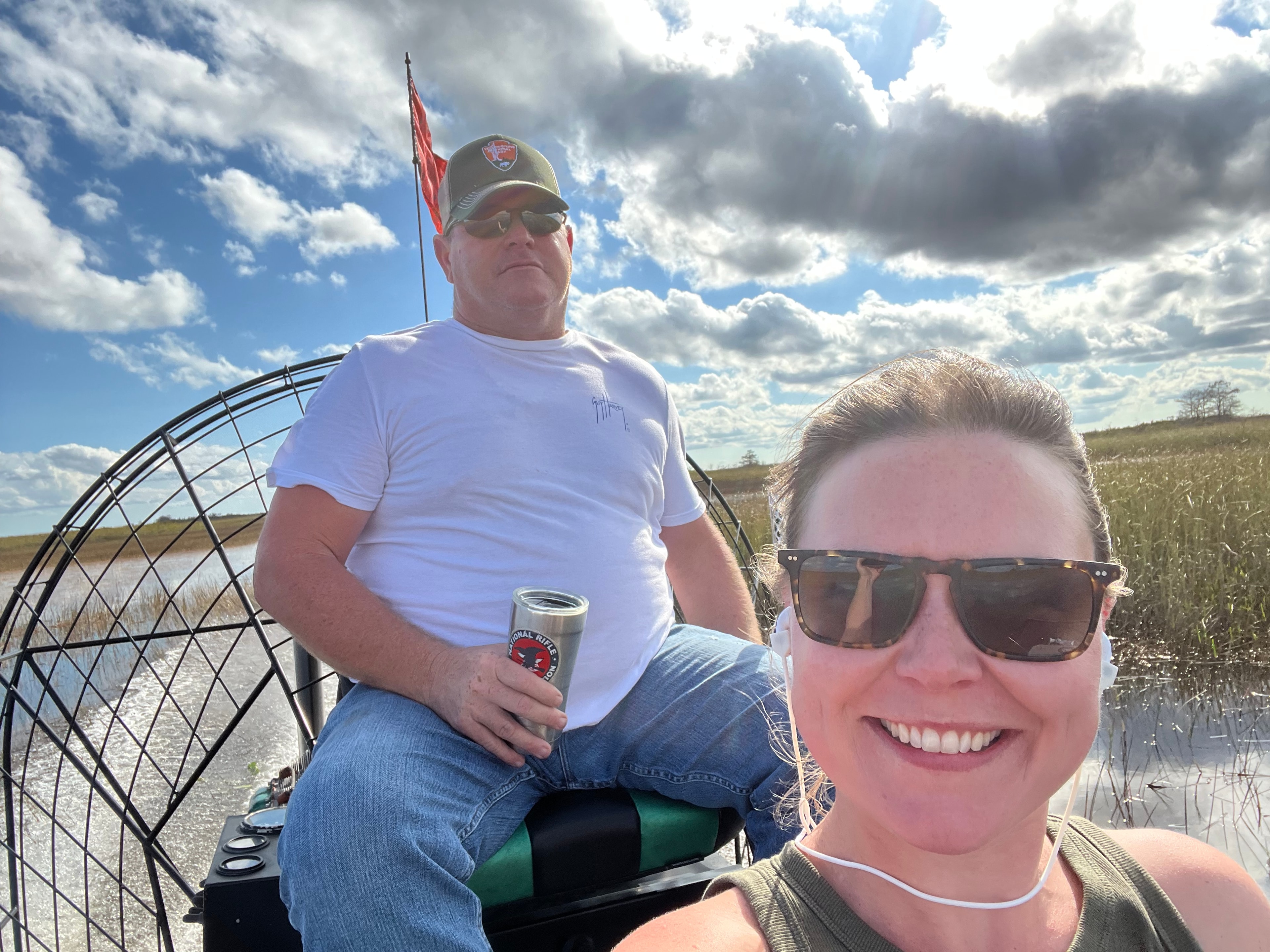 Katie Peduzzi happily riding on John's airboat through the Everglades on the way to airboat camp